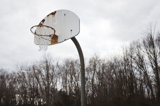 Un-used, wore-down, no-good, neglected basketball court