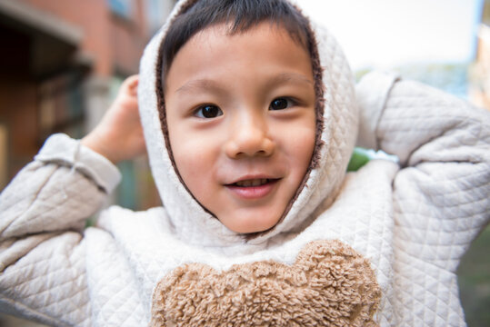 Cute Asian Kid in Hooded Jacket