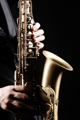 Obraz premium Saxophone player hands. Saxophonist
