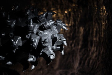 Shearer drill head in a coal mine