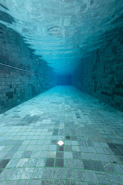 Empty swimming pool underwater
