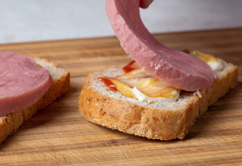 A banana sitting on top of a wooden cutting board