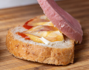 A banana sitting on top of a wooden cutting board