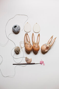 Easter bunnies made of eggs, one of them is broken