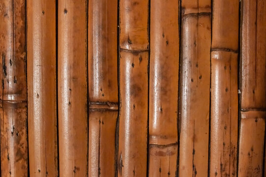 Tiki-style wooden background belonging to a bamboo table top, Ontario, Canada.