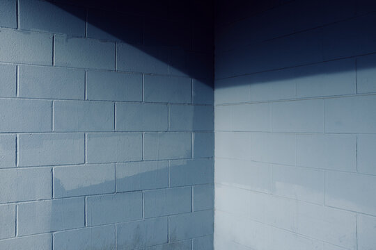 Painted Blue Cinderblock Wall With Shadow