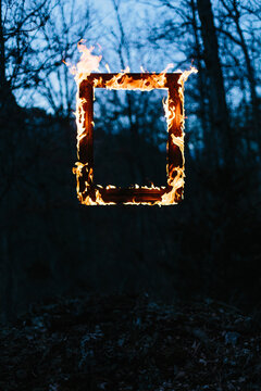 frame of flames in the dark