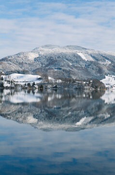 Winter landscape with mountain reflection near Mondsee, Salzburg, austria
