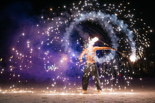 Man Performing Firework Dance