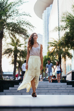 Beautiful woman walking in the city