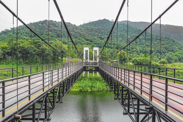 Suspension bridge at Mae Kuang Udom Thara dam, Chiang mai Thailand.