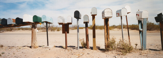 Row of mailboxes along rural road, Arizona
