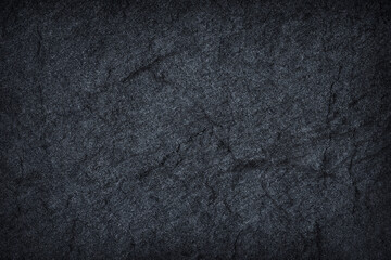 Dark grey black slate stone texture background