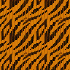 Tiger stripes seamless pattern with realistic knit texture. Modern animal print. Vector illustration.