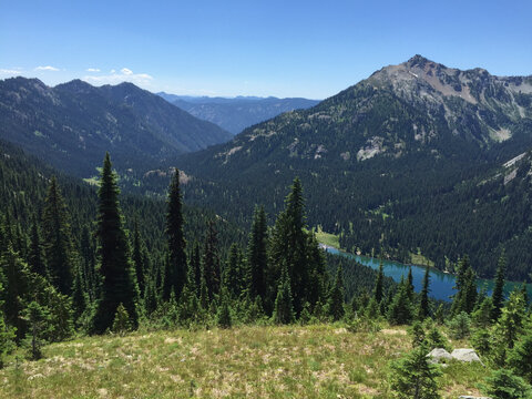 Pristine alpine lake and mountains in summer