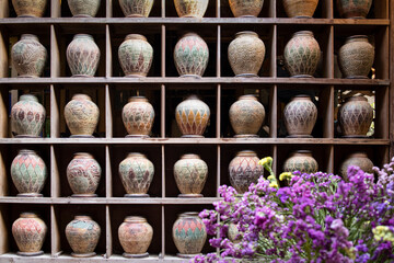 Old painted Northern Thai style pottery jugs