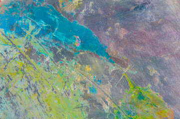 Naklejka na ściany i meble colorful creative motley background: smudged residues of oil paints on a wooden palette, short focus, selective blur