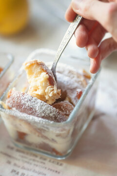 Spoon into the Brioche Pudding