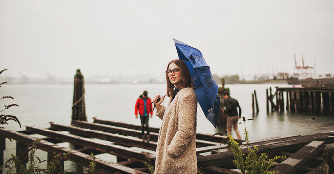 girl with blue umbrella