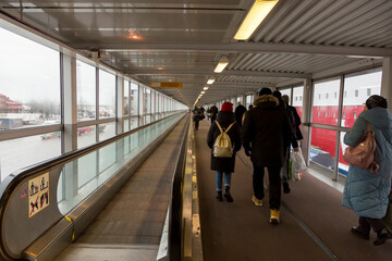 Passengers leaving the ferry in the port of Helsinki