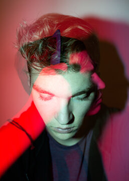 Double exposure portrait of a young man
