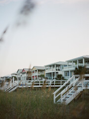 beach huts at sunset