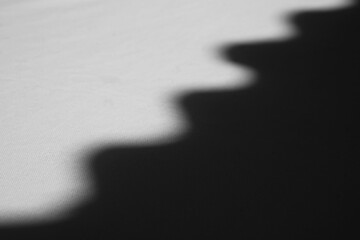Black and white of light and shadow wave texture background.