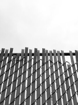 Low angle view of chain-link fence