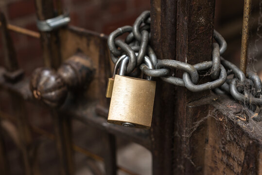 padlock with chain on a gate