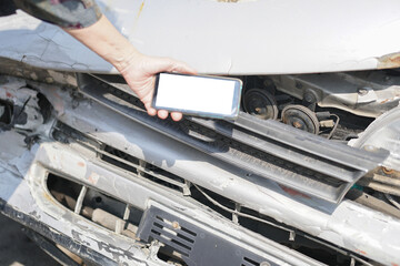 hand take photo of crashed damaged broken car. automobile crash accident