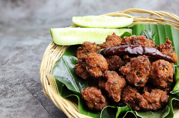 Larb Moo Tod, Spicy Fried Pork or Fried Larb in basket. Asia food Is a spicy Thai style popular
