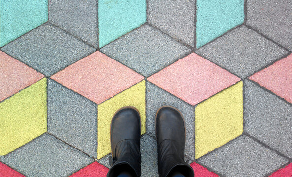 feet on colored ground