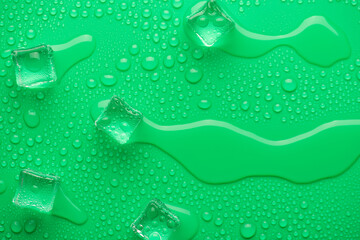 Top above overhead close up view photo of melting ice cubes on bright vivid color backdrop