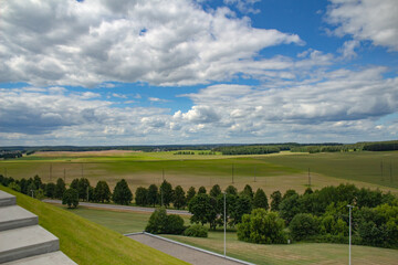 summer landscape of fields under a blue sky