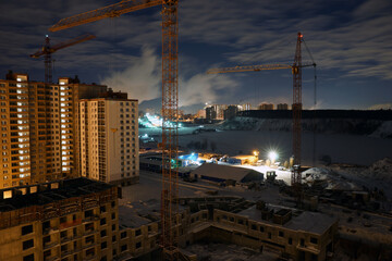 Night view of the construction site of a new house. Moscow region, Dzerzhinsky. January 2021.