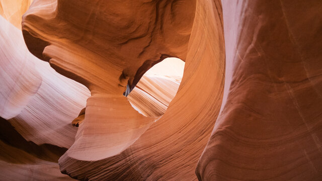 Colorful canyon wall erosion in desert.