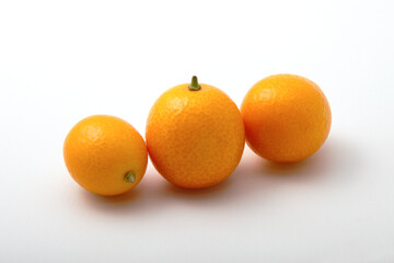 Macro photo of a small kumquat