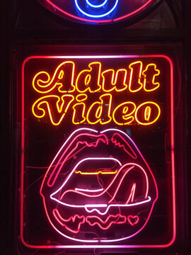 Neon signs lit at night