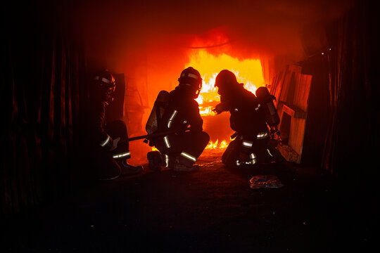 Firemen fighting a fire