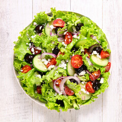 vegetable salad with cucumber, tomato, onion and tomato