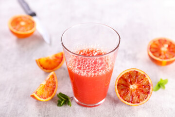 red orange juice in glass