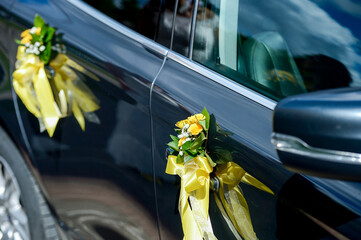 Beautiful flowers and wedding rings on the wedding day.