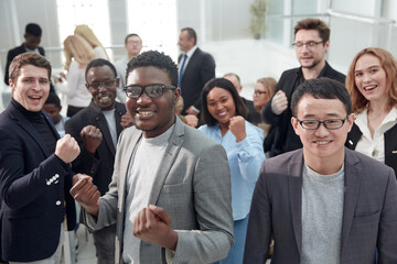 Multiethnic staff take part in educational training led by boss or coach participants