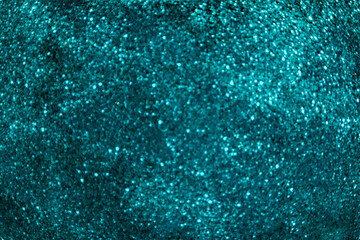 Fototapeta premium Abstract background / texture in blue, cyan colors. Sequins, bokeh, blur