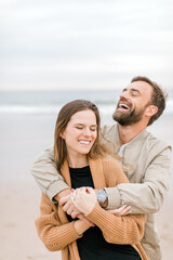 Engagement proposal at beach in Playa Del Rey, California Young Couple