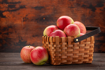 Ripe garden apple fruits in basket