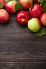 Ripe garden apple fruits on wooden table