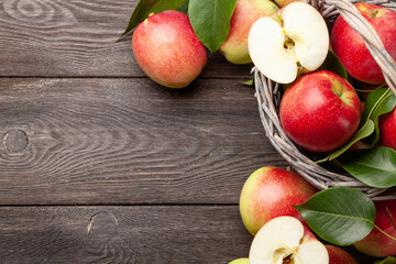 Naklejka na ściany i meble Ripe garden apple fruits in basket