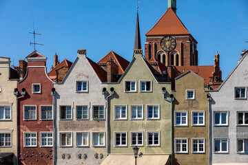 Fototapeta premium Gdansk, Old Town - historic tenement houses with gables on the banks of the River Motlawa, Poland