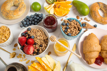 Happy breakfast with granola, croissant.